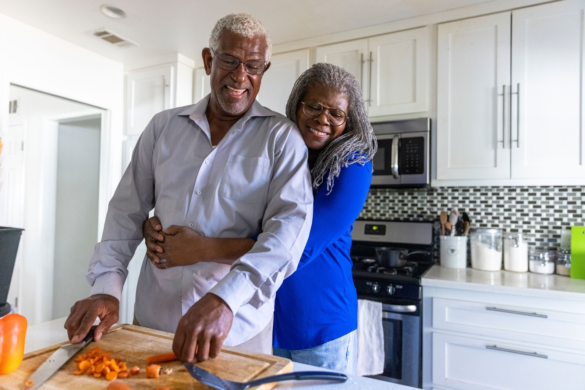 Senior Black Couple Making Dinner in the Kitchen